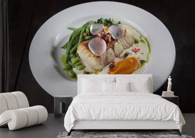 Pike perch with white sauce and beans. A white plate. Menu for the restaurant. A dish of eyelash fish. Healthy and low-calorie food.opy space. Flat lay. Wall mural