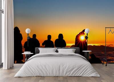 Silhouette of crowd enjoying the sunset atop Mount Haleakala on Maui, Hawaii Wall mural