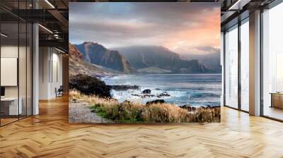 Sunset from Kaena Point on the west coast of Oahu, Hawaii on a cloudy day Wall mural