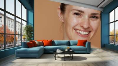 happy young woman with wet face washing Wall mural