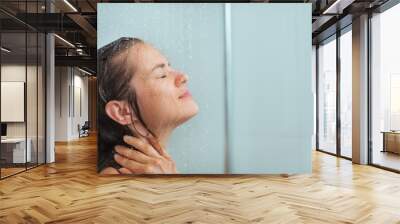 Portrait of woman taking shower Wall mural