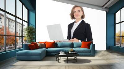 Portrait of young business woman holding laptop with hand pointing up , isolated on white background Wall mural