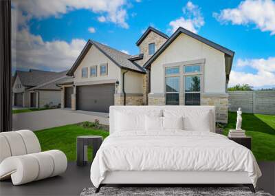 a family home with a green lawn  Wall mural