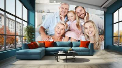 Photo, portrait and big family with smile in their house together in the living room. Happy elderly people with girl child, mother and father for love and happiness in the lounge of their home Wall mural