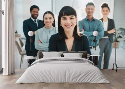 Portrait, collaboration and management with a leader woman and her team standing arms crossed in the office. Vision, teamwork or diversity and a female manager posing at work with her employee group Wall mural