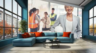 Portrait, construction worker and leader with an engineer woman at work in her architecture office. Industry, design and building with a ceo architect manager working on a development project Wall mural