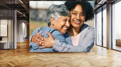 Senior women, workout hug and smile closeup with fitness and exercise outdoor for health. Elderly people, sport training and happy friends with bonding and embrace after running of a mature athlete Wall mural