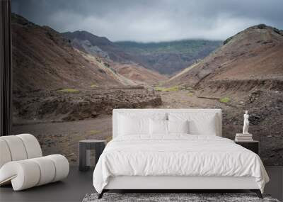 Dry river bed and rocky outcrops at Sandy Bay, St Helena Wall mural