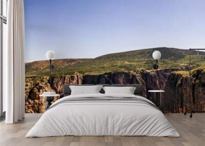 Panorama shot of edge of rocky walls in black canyon of gunnison at sunny day in america Wall mural