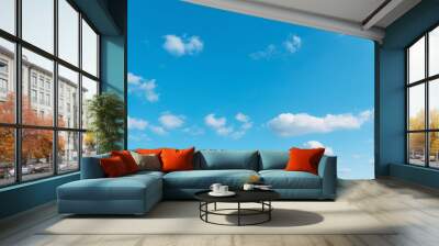 Blue sky background with cumulus clouds Wall mural