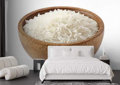 Dry white long rice basmati in wooden bowl isolated on a white background. Wall mural