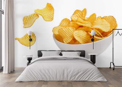 Ridged potato chips in bowl isolated on white background Wall mural