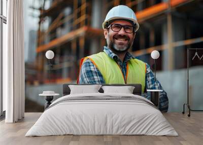 a engineer or architect wearing safety uniform and hard hat. smiling looking at camera at a construction site, front view, background, wallpaper. Wall mural