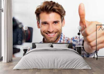 Optimistic man having bristle and brown hair showing ok sign on camera with sincere look, isolated over white background Wall mural