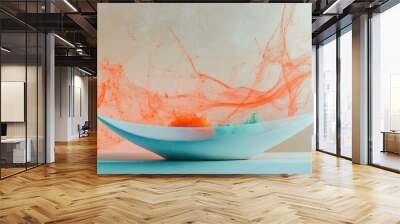 An artistic display featuring a white bowl filled with colorful fluids, set against a soft gradient backdrop. The vibrant colors create a dynamic visual effect. Wall mural