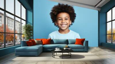 Happy African American Boy Portrait on Blue Background. Smiling Face of a Young Black Child Wall mural