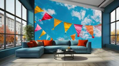 Summer Event Celebration with Colorful Bunting under Blue Sky Wall mural