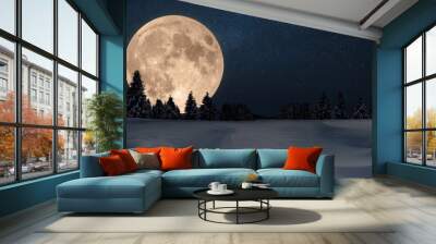 Amazing beautiful big moon in the night sky with stars and winter forest with snow. Winter holidays and night landscape.Christmas night Wall mural