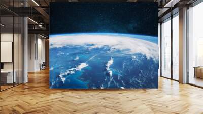 Amazing blue planet earth with ocean, clouds and continents in open space on the starry sky. Wall mural