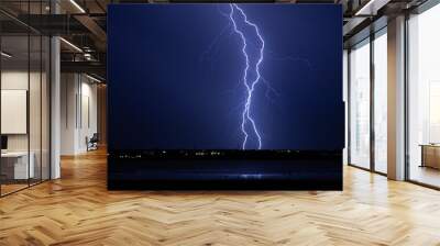 Double Lightning Bolts at Night Near Water Wall mural