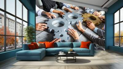 Business people joining gears Wall mural