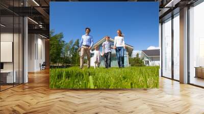 Family walking on lawn near house Wall mural