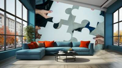 Hands holding puzzle Wall mural