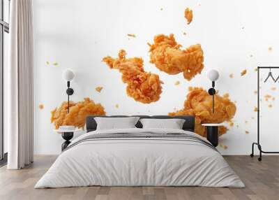 Crispy fried chicken falling apart isolated on white background Wall mural