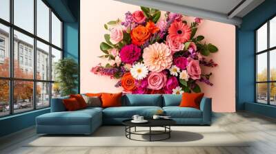 Top-down shot of assorted flowers, including roses, daisies, and lavender, arranged in a circular pattern on a pale beige background, evoking a joyful and fresh atmosphere Wall mural