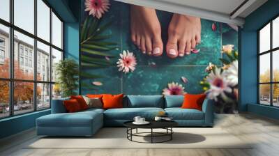 Beautiful spa day with elegant female feet and blossoms captured in a closeup, topdown view Wall mural