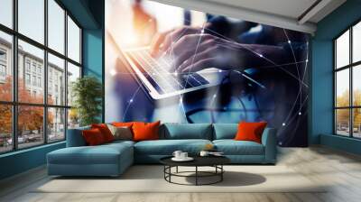 Business man works in office with laptop. Concept of internet network. double exposure Wall mural