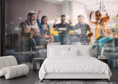 Business people in office are happy for the company trend and the success of the startup Wall mural