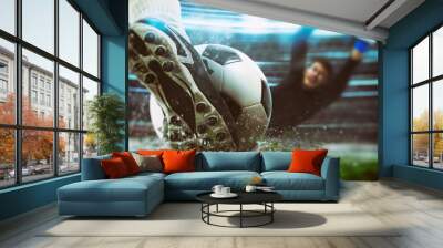 Football scene at night match with close up of a soccer shoe hitting the ball with power Wall mural