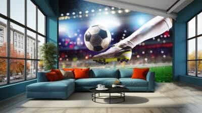 Football scene at night match with close up of a soccer shoe hitting the ball with power Wall mural