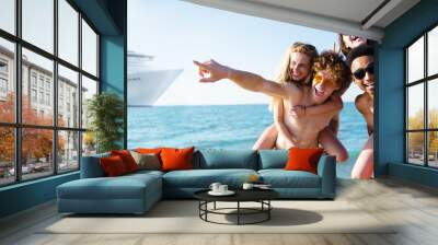 happy smiling couples who travel by cruiseship. concept of holiday and summertime Wall mural