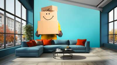 Man is hidden by too many received packages. Cyan background Wall mural