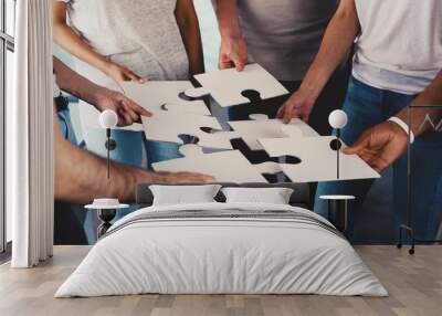 Team of businessmen work together for one goal. Concept of unity and partnership Wall mural