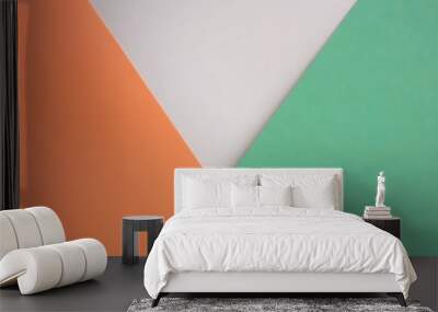 Abstract minimalistic tricolor background. White, orange and green paper in triangular and polygon shape. Wall mural