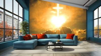 White shining Christian cross and heart in the orange cloudy sky Wall mural