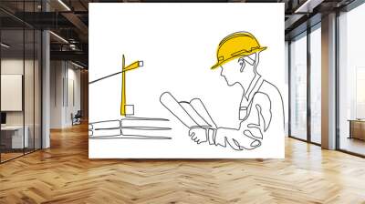 Architect man holding building plan and wearing yellow hardhat. Construction crane on background. One continuous line art drawing vector sketch of architect Wall mural