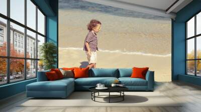 little boy running on the beach Wall mural