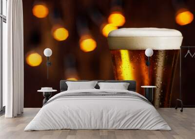 glass of beer with foam and bubbles Wall mural