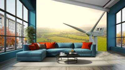 Aerial photo of wind turbines at sunset in Sainte Pazanne, France Wall mural