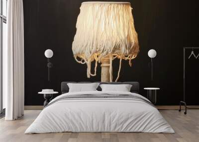 frayed cord of an unplugged table lamp Wall mural