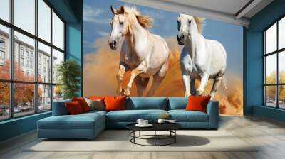 Two horse run free in desert sand Wall mural