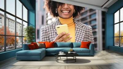 Afro business woman on a break from work. Wall mural