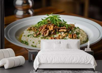 A plate of risotto with mushrooms on a wooden table Wall mural