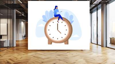 Flexible working hours, work life balance or focus and time management while working from home concept, young lady woman working with laptop while doing yoga or meditation on clock face. Wall mural