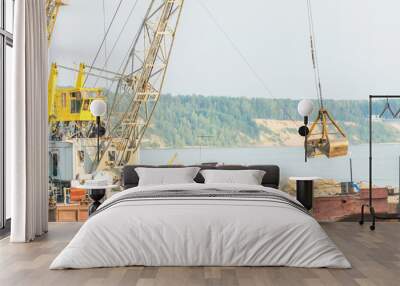 Crane for loading cargo in port Wall mural