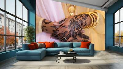 Black Muslim bride showing henna and ring Wall mural